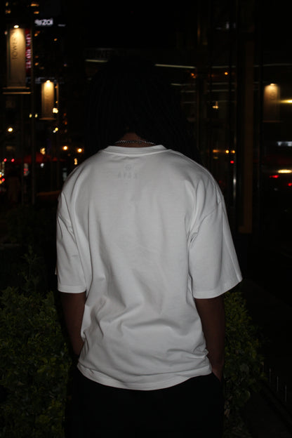 “Chaos Breeds Brilliance” T-Shirt (White)